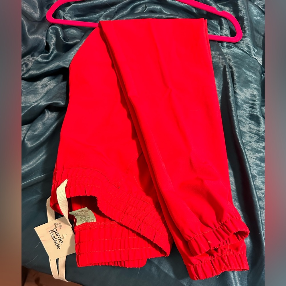 New Xs garde-malade pants with tag